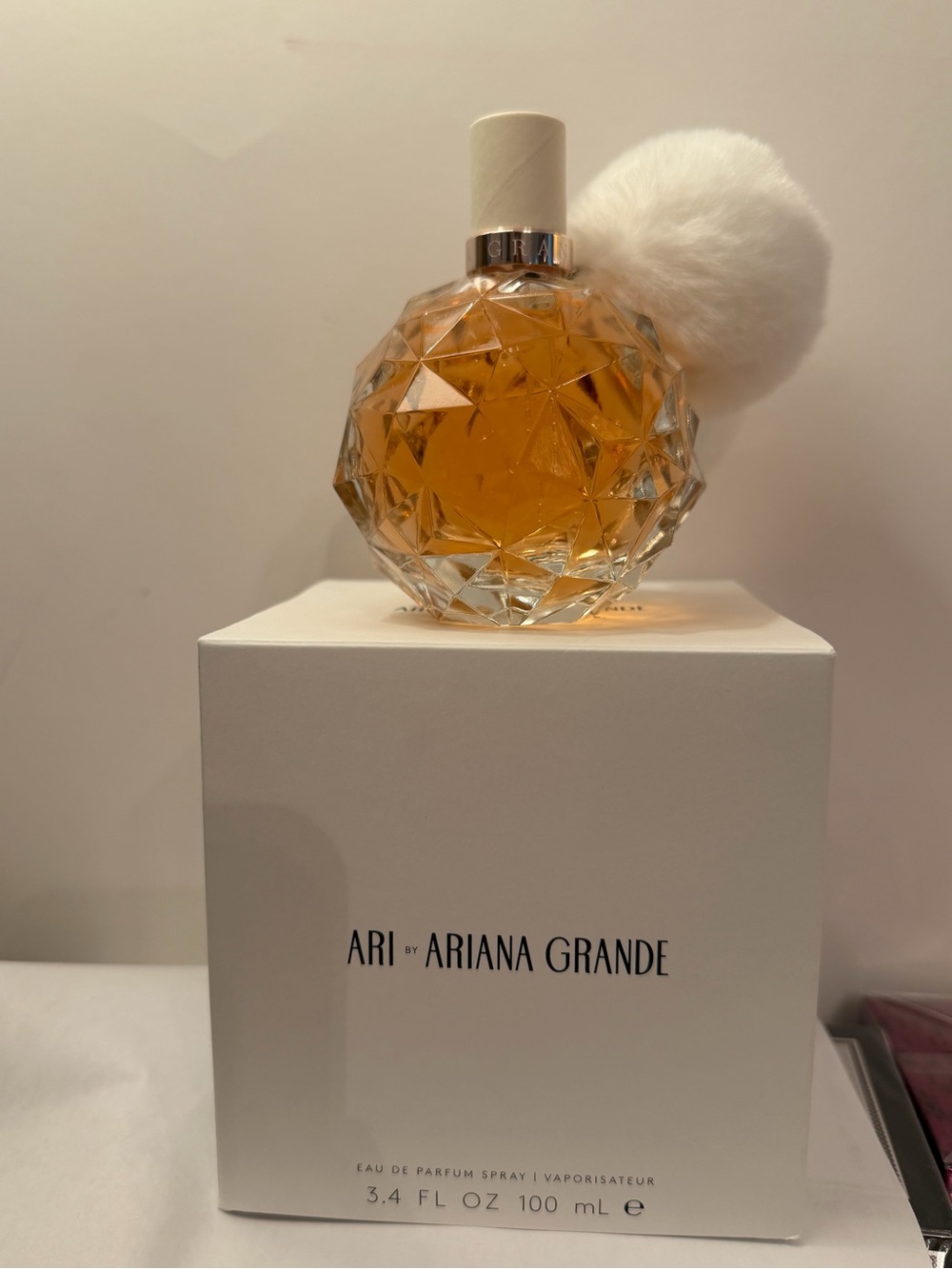 Ariana Grande Amber Faceted Bottle with White Pom-Pom